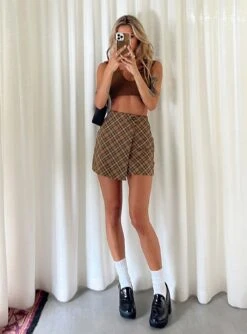 Princess Polly Davenport Mini Skirt Brown 13 Princess Polly Davenport Mini Skirt Brown -Princess Polly Shop 0 modelinfo cathlin us2 c0e30dc2 1c71 45cc 879b 9effe0064b3c